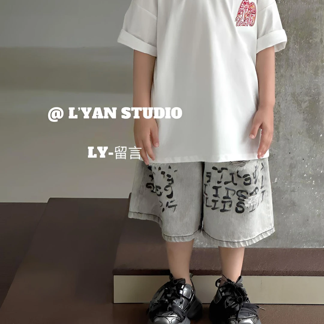 【杨少华服饰】夏季新款水洗做旧英文印花破洞短裤98017