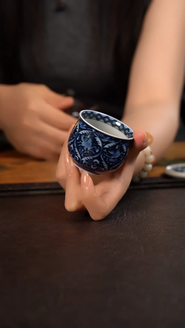 洪印慕明蓝地凤鸟瑞兽大肚杯