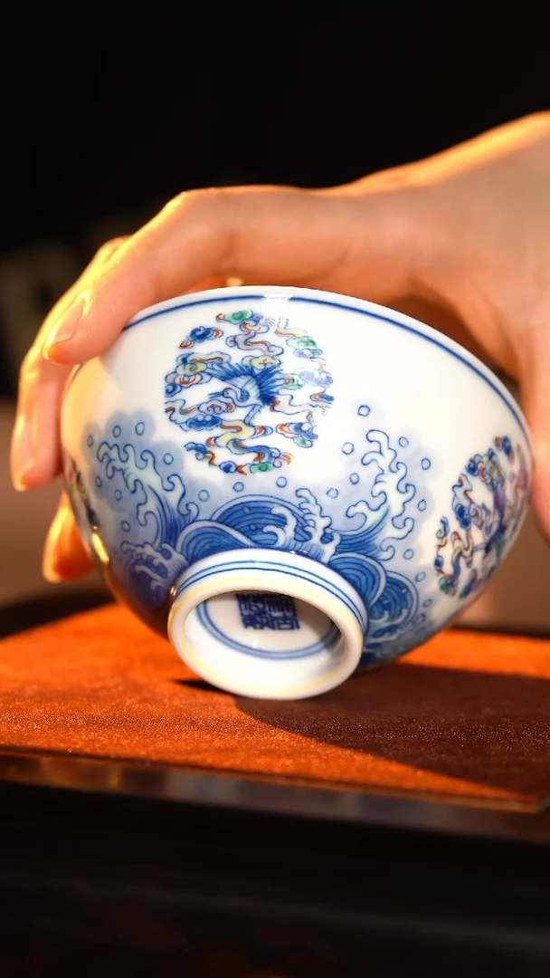 J涂杏花窑斗彩海水团鹤杯