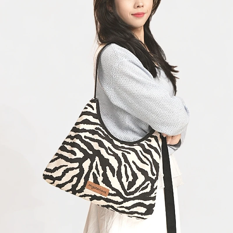 尼睿2025新款原创设计斑马纹文艺单肩包大容量帆布斜挎包女包AS