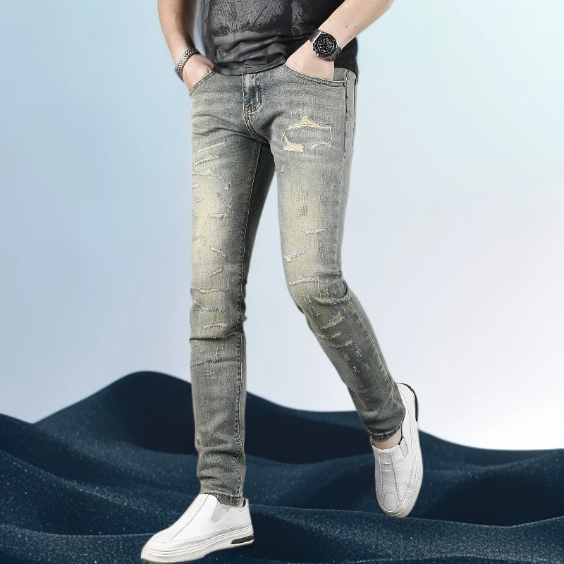 巴赛娜缇男士复古新款破洞牛仔裤男款修身小脚黄泥色水洗弹力裤子