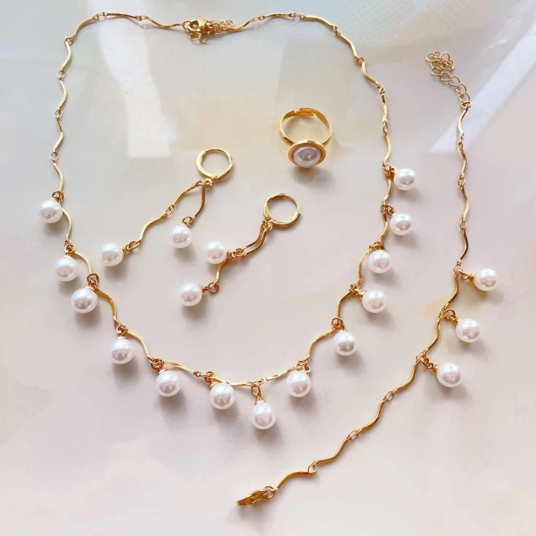 钛钢仿珍珠项链 钛钢仿珍珠项链  流苏白珠珠时尚气质四件套