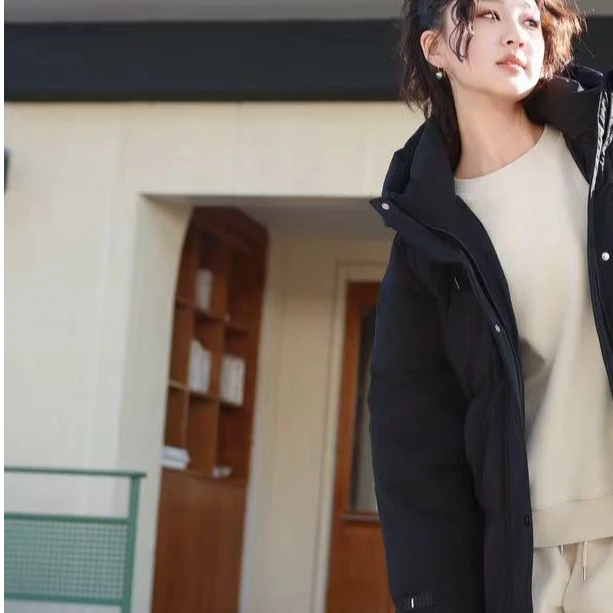 东2025【X】1月4日 男童女童时尚黑色潮版羽绒服6219-