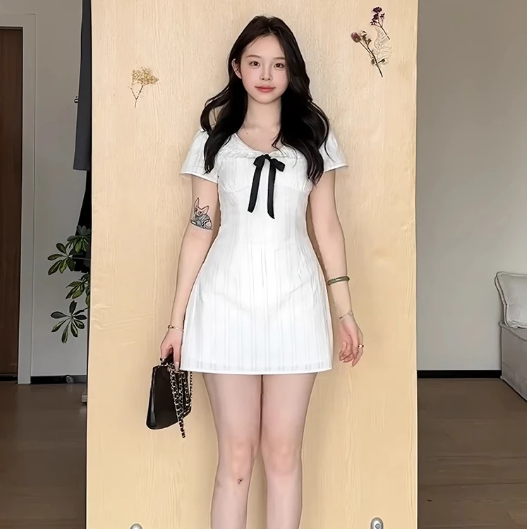 韩系纯欲白色波点飘带无袖露肩短裙女夏季甜妹时尚修身显瘦花苞裙