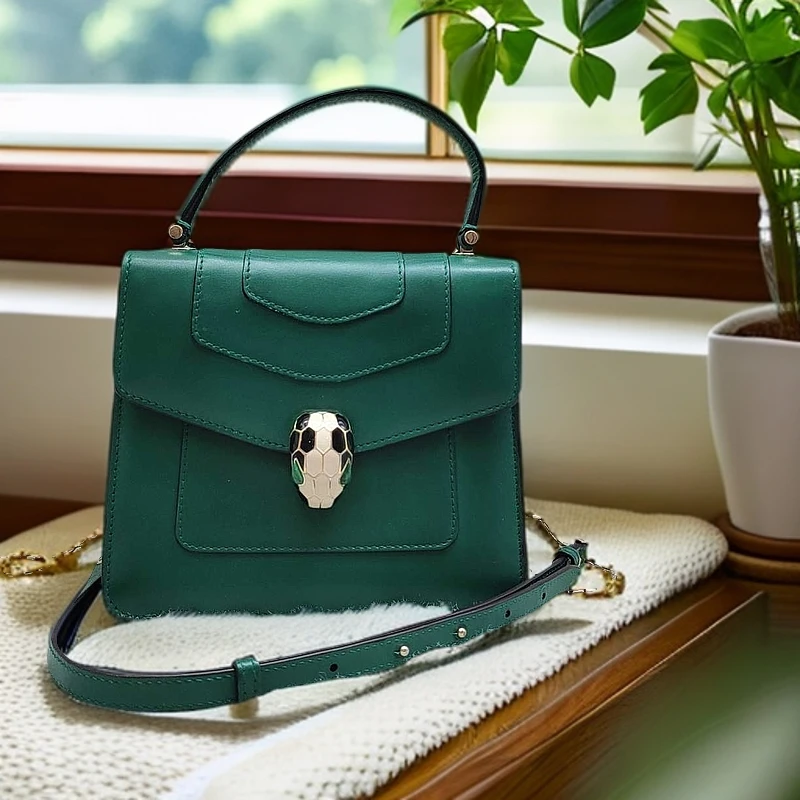 95新 BVLGARI/宝格丽  绿色 蛇头 风琴 斜挎包  1301 0840