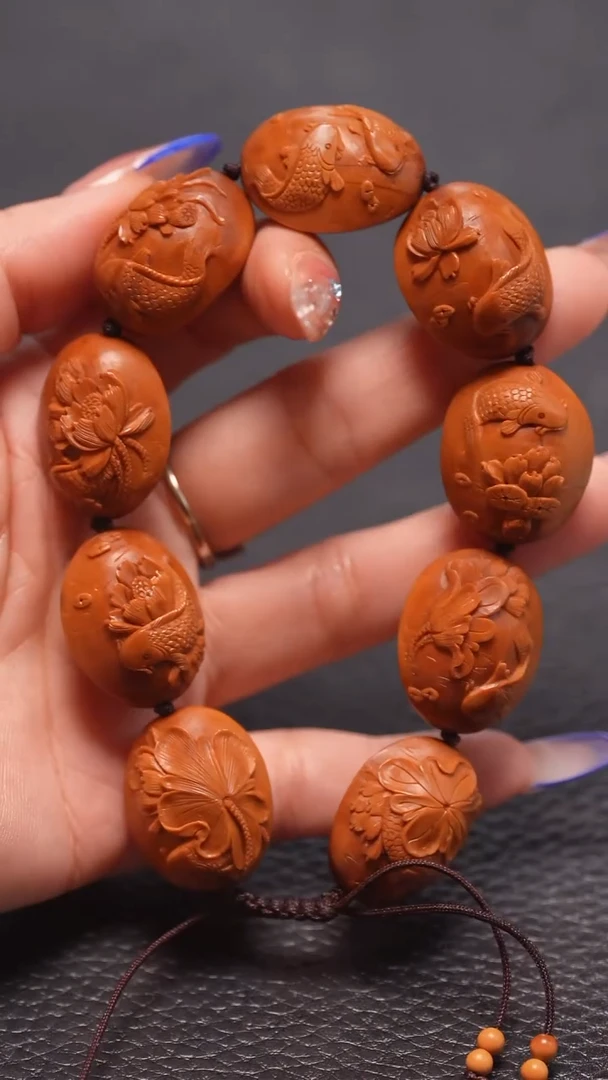 手串橄榄核2.0/单面荷叶鱼微花处理