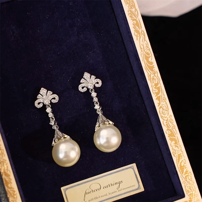 钛钢仿珍珠耳饰 长款耳环仿珍珠吊坠轻奢高级大气复古法式耳坠