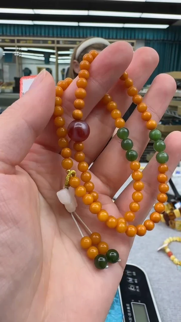 未镶嵌琥珀手链181秒拍号 假一罚三