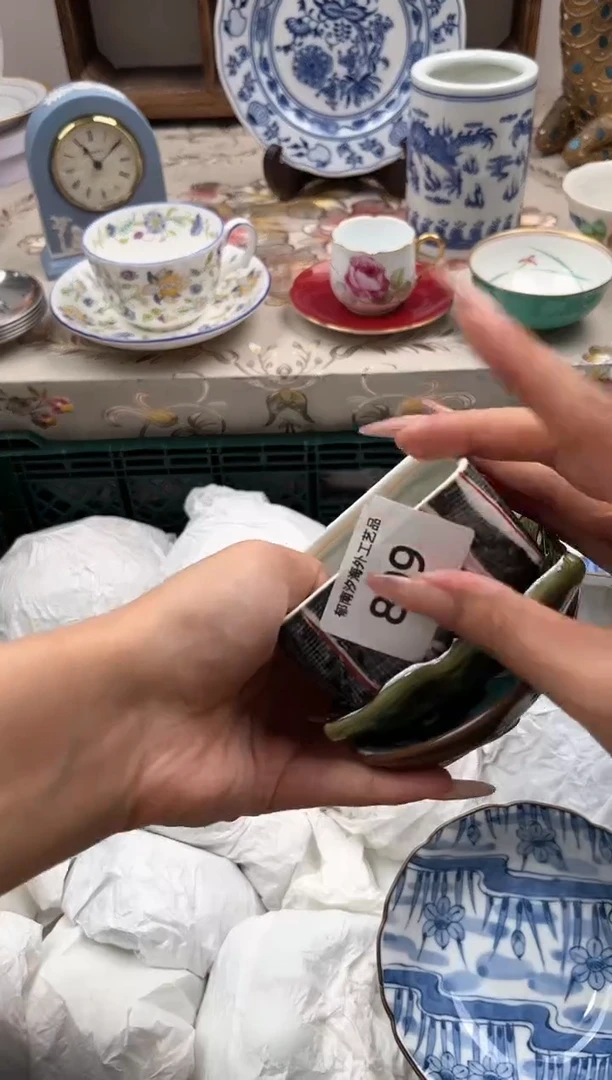 瓷片忧***朱J         809
