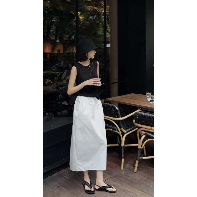 设计感小众白色半身裙秋季松紧腰抽绳花苞裙高腰后开叉A字中长裙