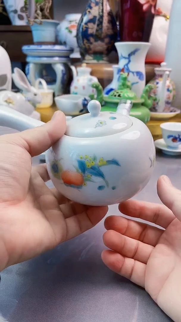 瓷片日产侧把壶一一