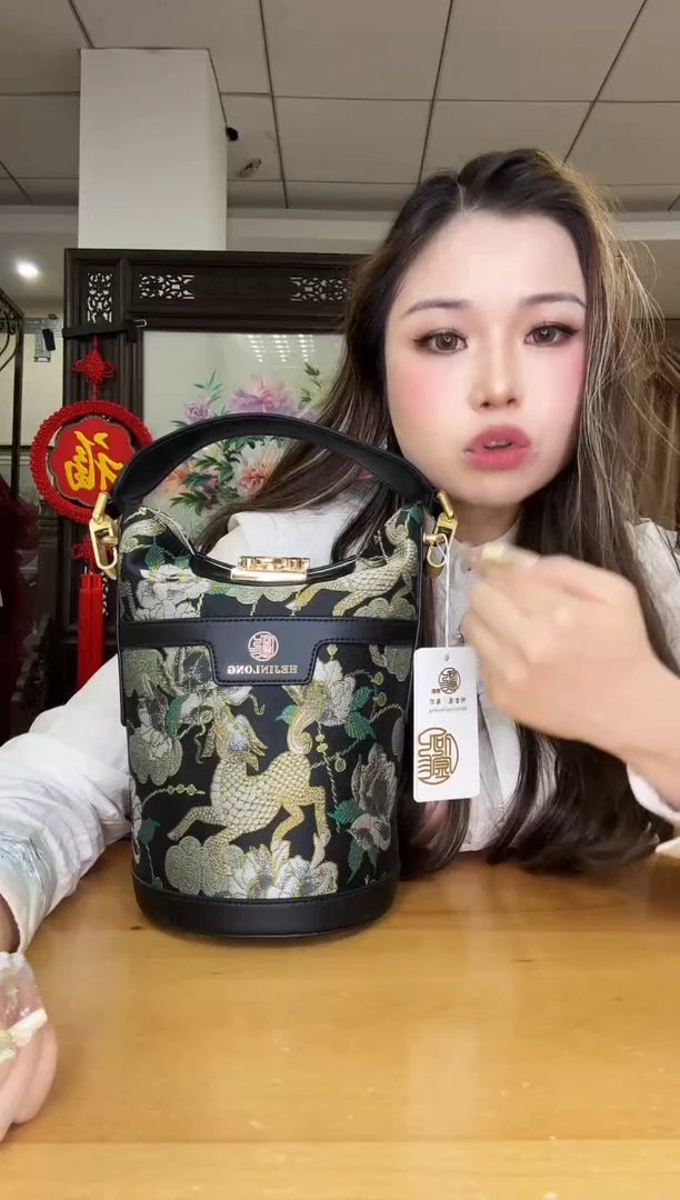 织物默*言黑色桶包