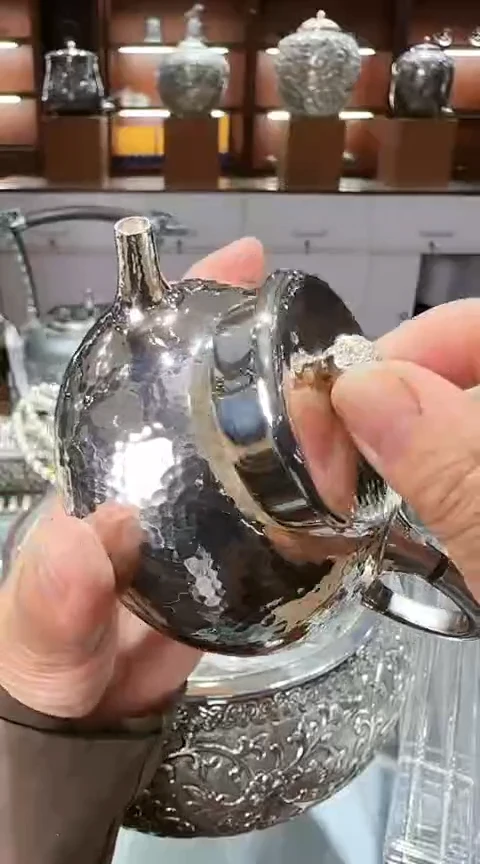 足银999精工手工三足石瓢锤纹泡茶壶