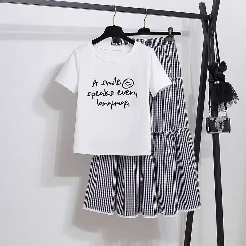 连衣裙女2025年超火夏季新款短袖刺绣黑白格子蛋糕半身裙两件套装
