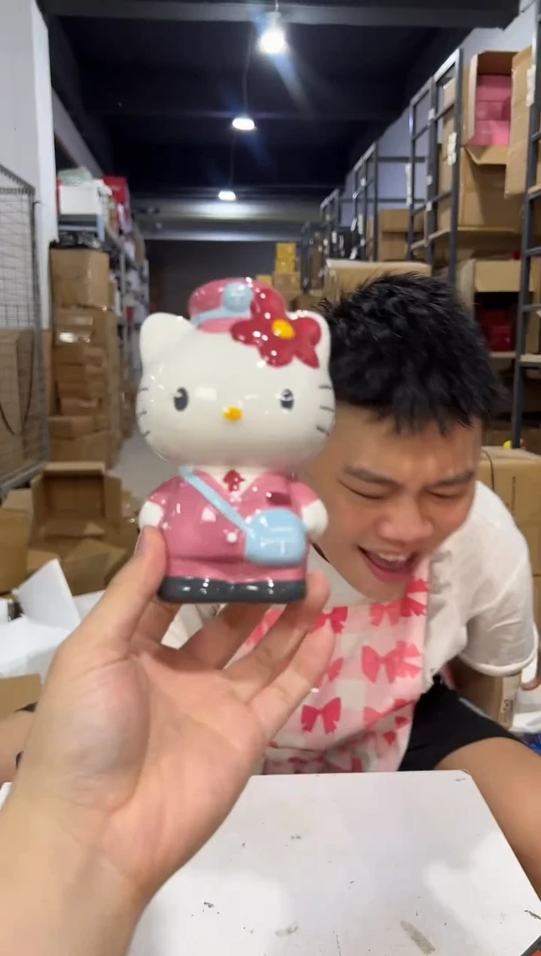 瓷片粉色邮递员kt存钱罐