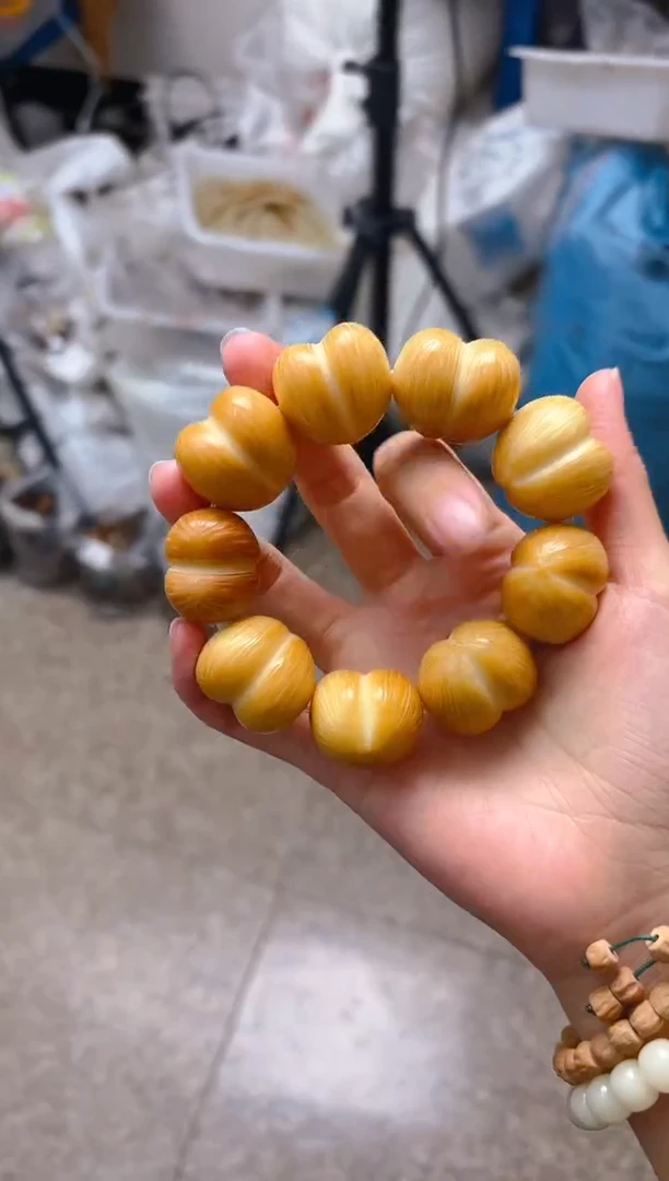 吊坠菩提根/象牙果黄色屁桃单圈手串