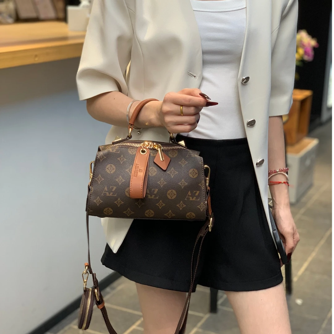 恒蔓伊2025新款时尚百搭单肩圆筒包斜挎枕头包妈妈出门包包轻奢