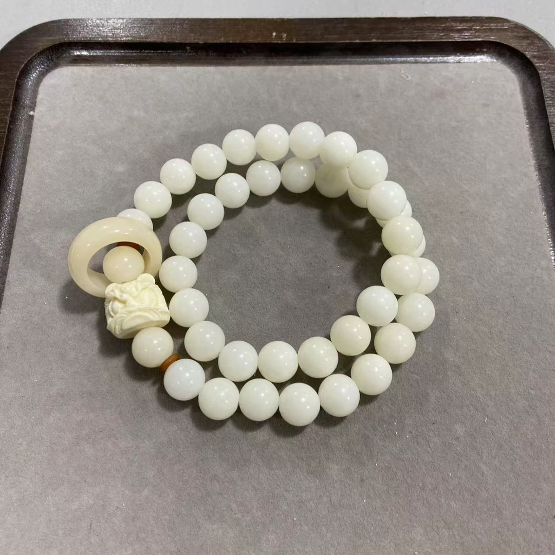 P767羊脂白菩提卡1.0圆珠醒狮款双圈手串