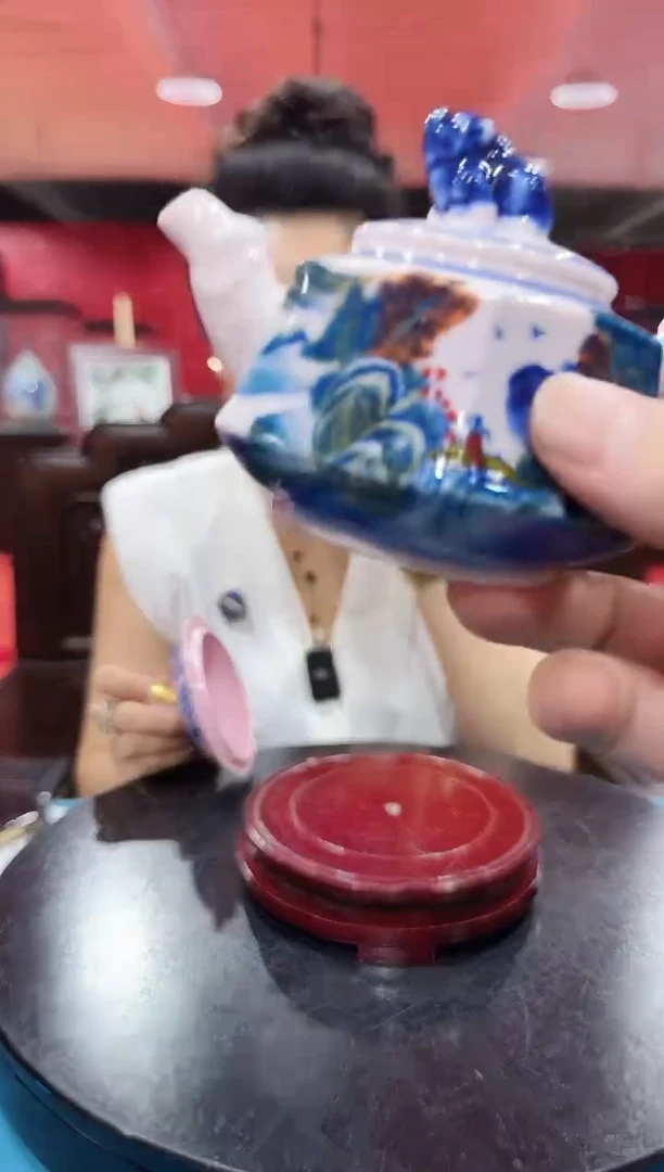 陶瓷红稀土六方山水壶
