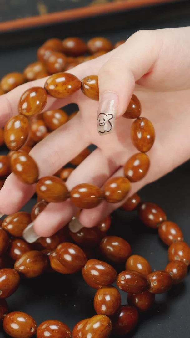 紫金鼠手串紫金鼠油核枣珠尺寸随机