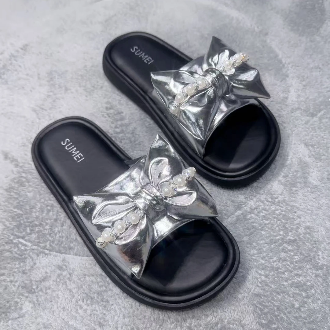 羊皮仙女风平底拖鞋女夏季新款韩版水钻蝴蝶结一字休闲沙滩凉拖鞋