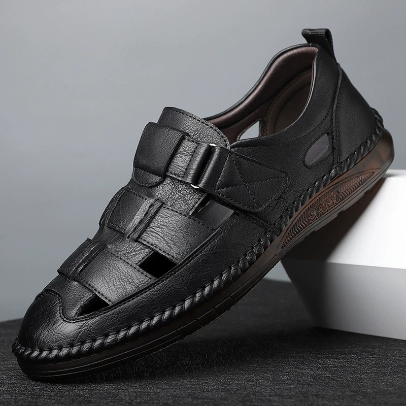 高档男士精品2025新款真皮透气镂空洞洞鞋百搭时尚包头软底皮凉鞋