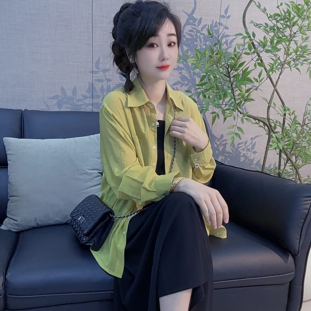 丹丹精选--122新款翻领单排扣长袖后背开叉系绳衬衣