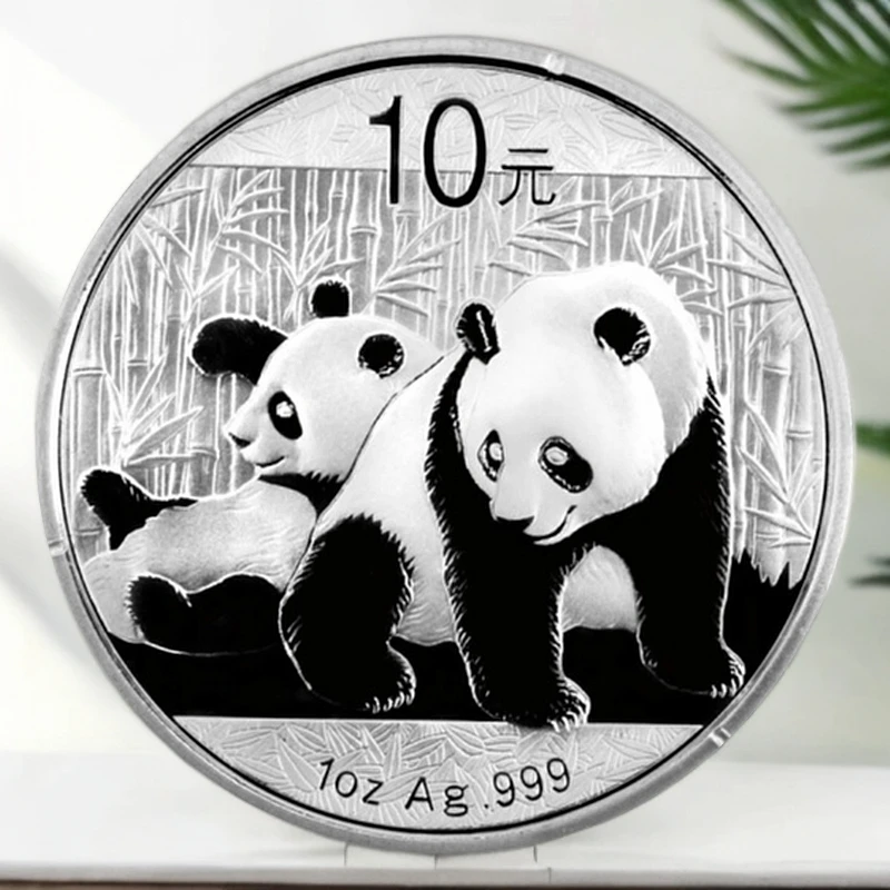 2010年《熊猫》金银纪念银币1盎司（有微小白点）