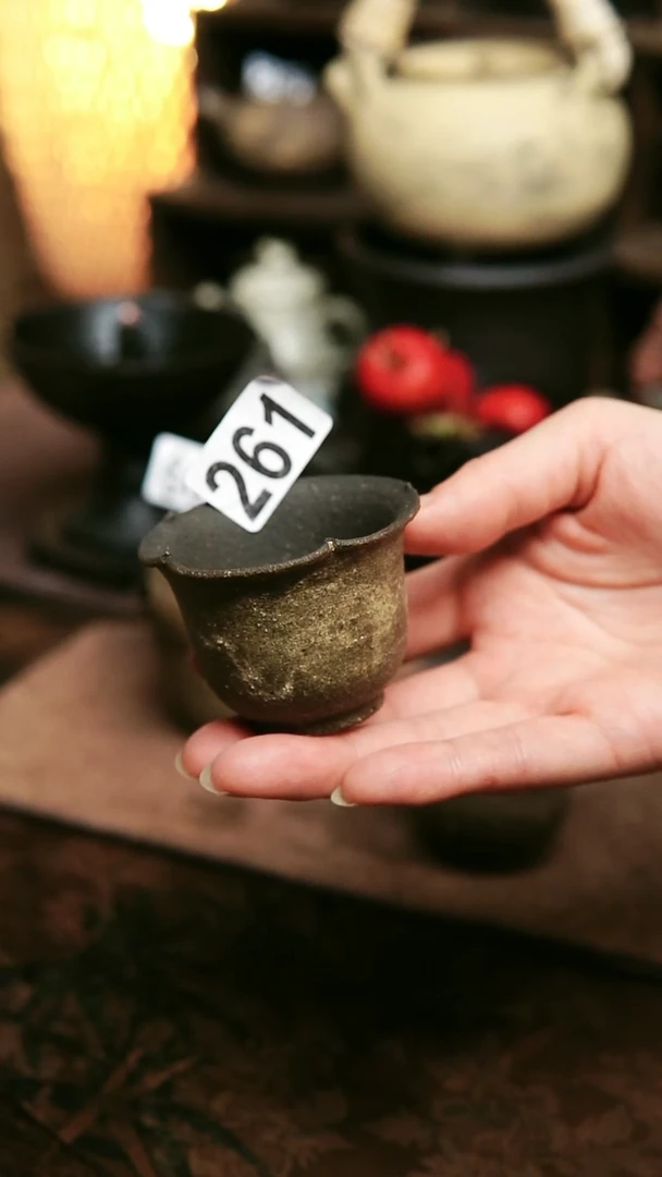 _****度紫砂全手工花口杯