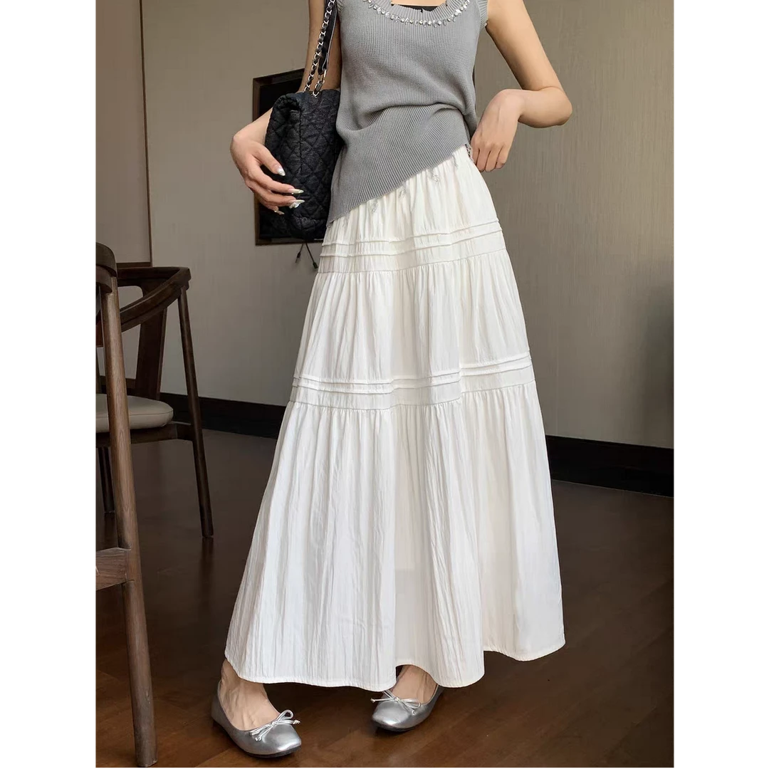 法式白色显瘦a字半身裙女2025早秋新款蛋糕伞裙垂感气质中长裙子