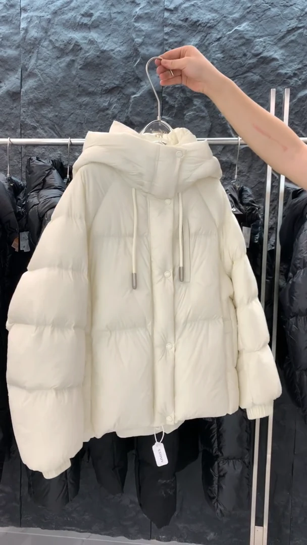 白色保暖棉衣棉服女2025冬新款独特气质短款宽松显瘦外套面包服潮