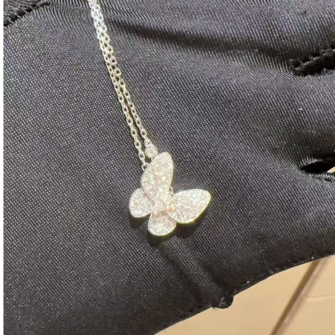 62-XL单蝴蝶白贝蝴蝶925银莫桑钻渡18K气质时尚百搭 发夹