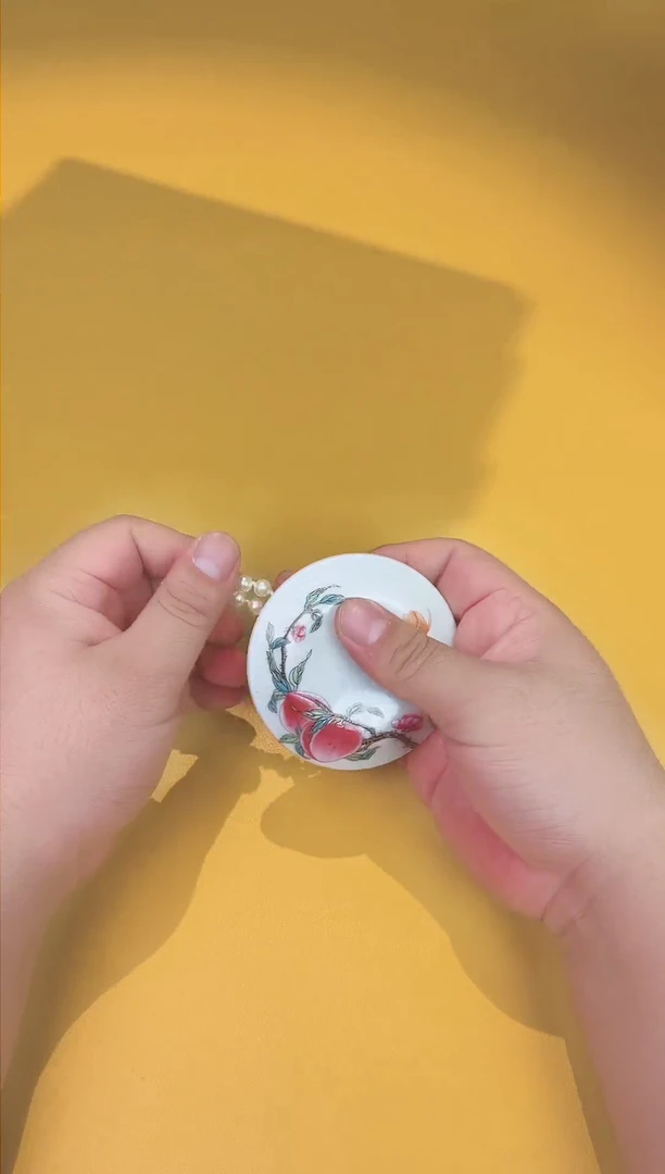 瓷片珍珠手