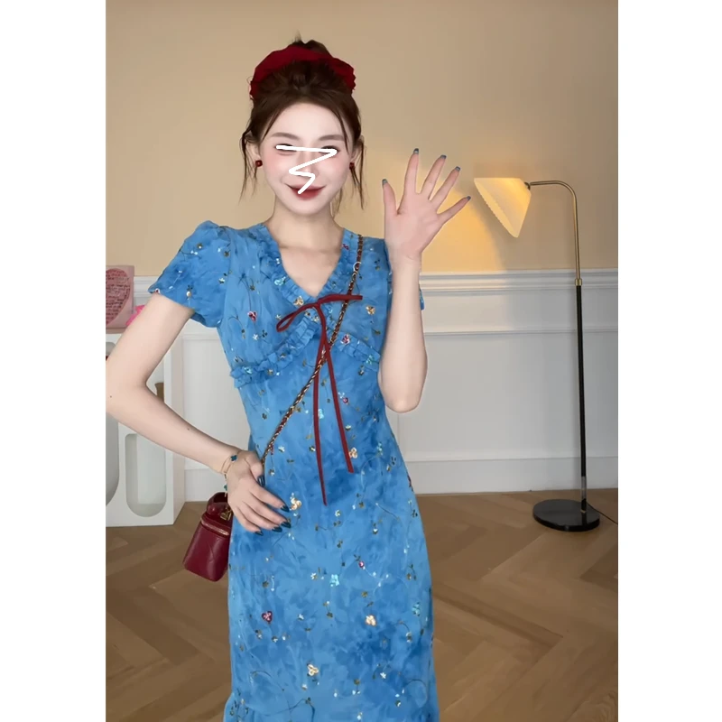 天蓝色油画一字肩连衣裙女夏季新款海边度假风沙滩裙性感露肩长裙