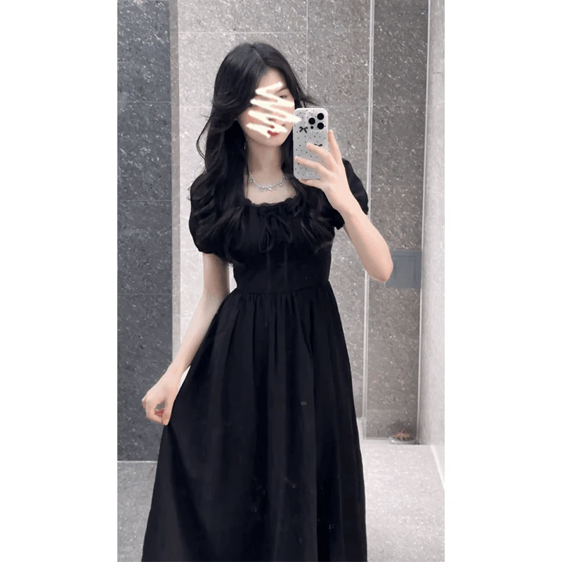 法式气质小众赫本风黑裙法式高级感一字领中长款黑色泡泡袖连衣裙