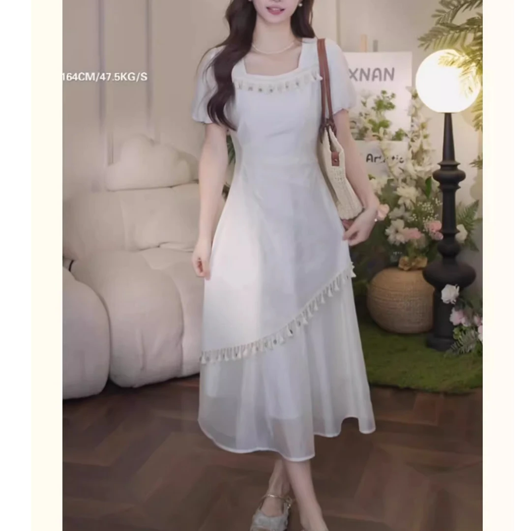 法式轻熟风流苏短袖连衣裙女2025夏季新款设计感洋气显瘦长裙