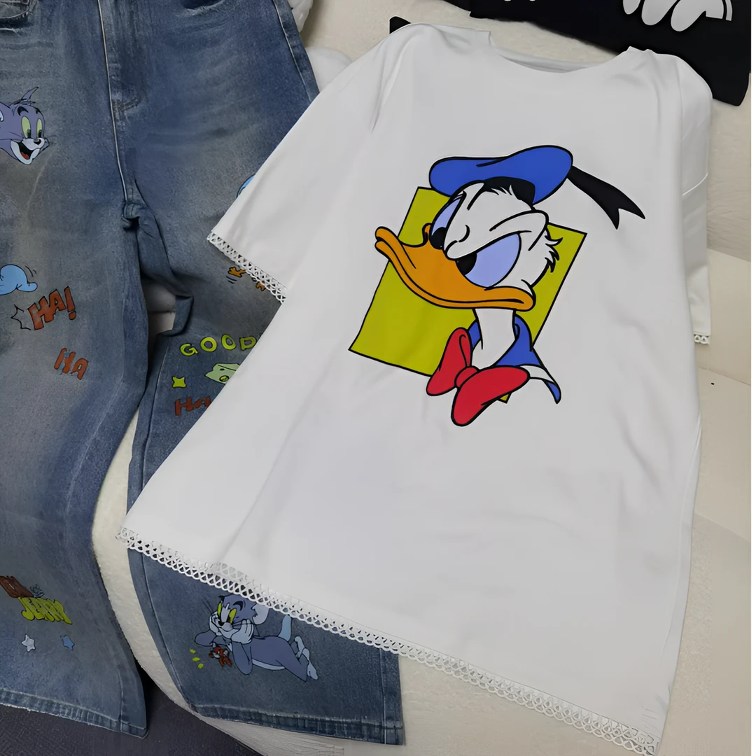 BLX--1169（深圳出品）新款小众设计款卡通印花拼接蕾丝边上衣