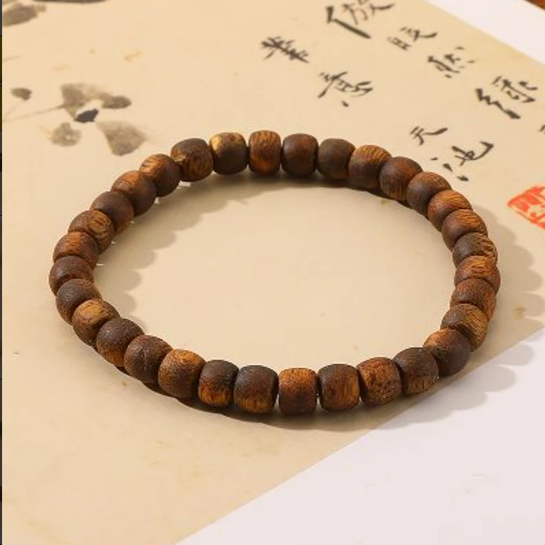 沉香一了个卜奇楠手串