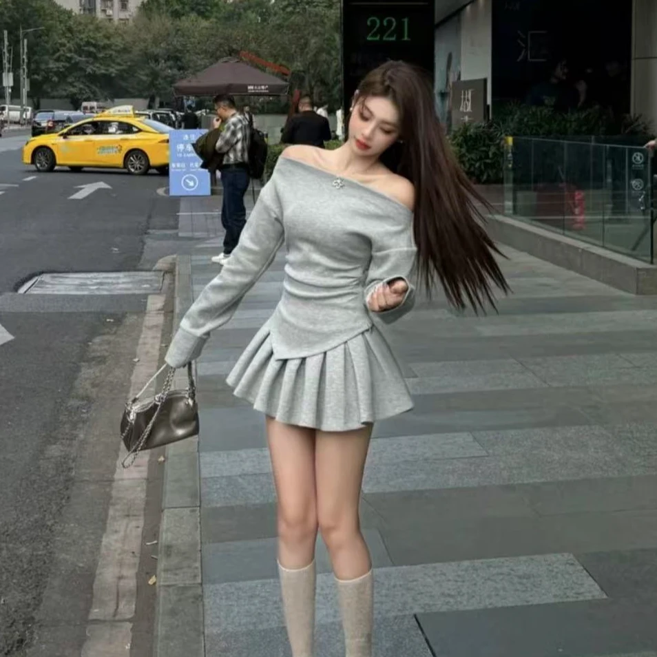 辣妹不规则一字肩收腰卫衣高腰百褶半身裙两件套女