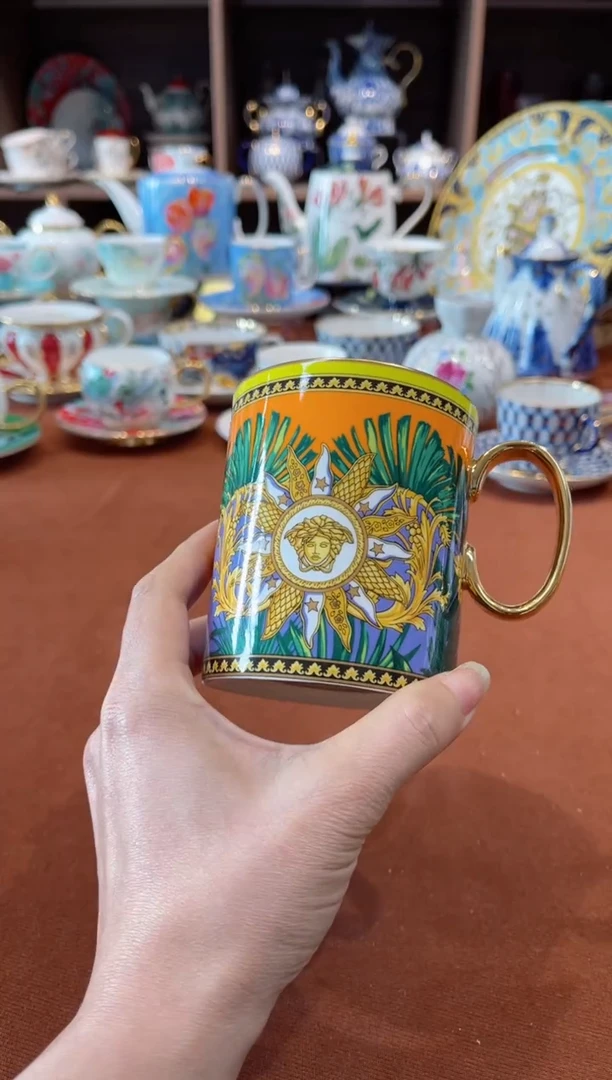 【闪购商品】瓷片雨林橙马克杯······