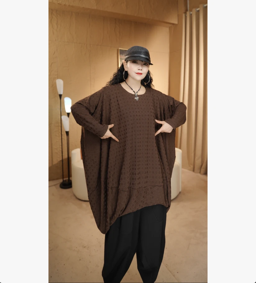 32宽松不规则下摆显瘦连衣裙