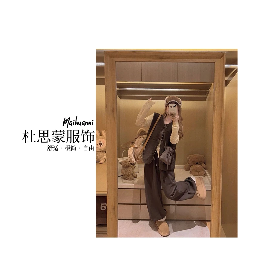 （杜思蒙服饰）-【宝藏衣橱】韩系净版极简风毛毛纽扣双口袋马甲 5710
