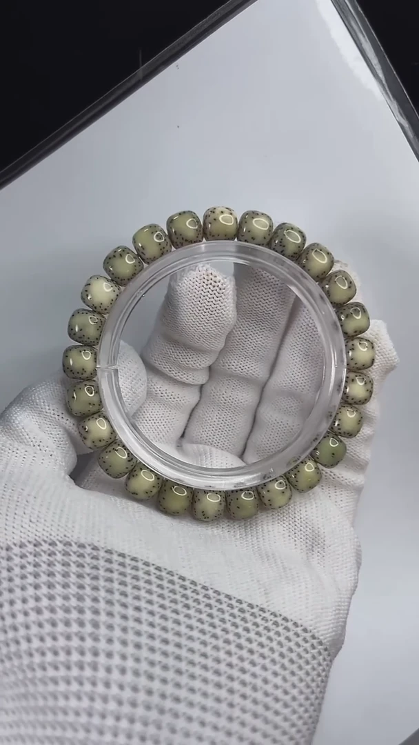 手串星月菩提小驼包9x8.c566