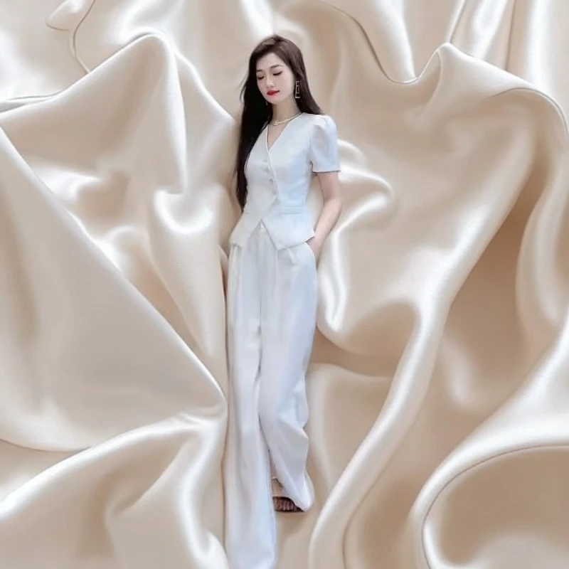 两件套高雅时尚套装女2025夏季新款高级斜纽扣小西服上衣气质长裤