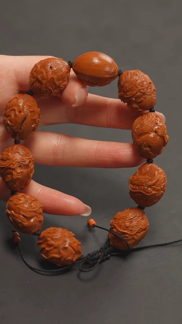 橄榄核手串九龙献瑞