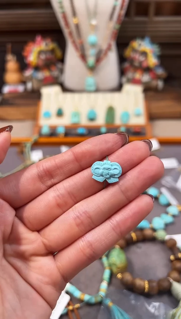 未镶嵌绿松石配饰蝴蝶结小象