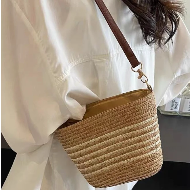 跨境编织包包女2025夏新款时尚条纹单肩斜挎水桶包海边度假沙滩包