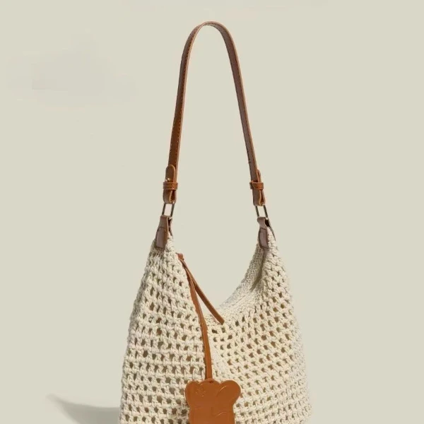 慵懒风草编腋下包包女2025新款海边休闲度假大容量编织托特水桶包