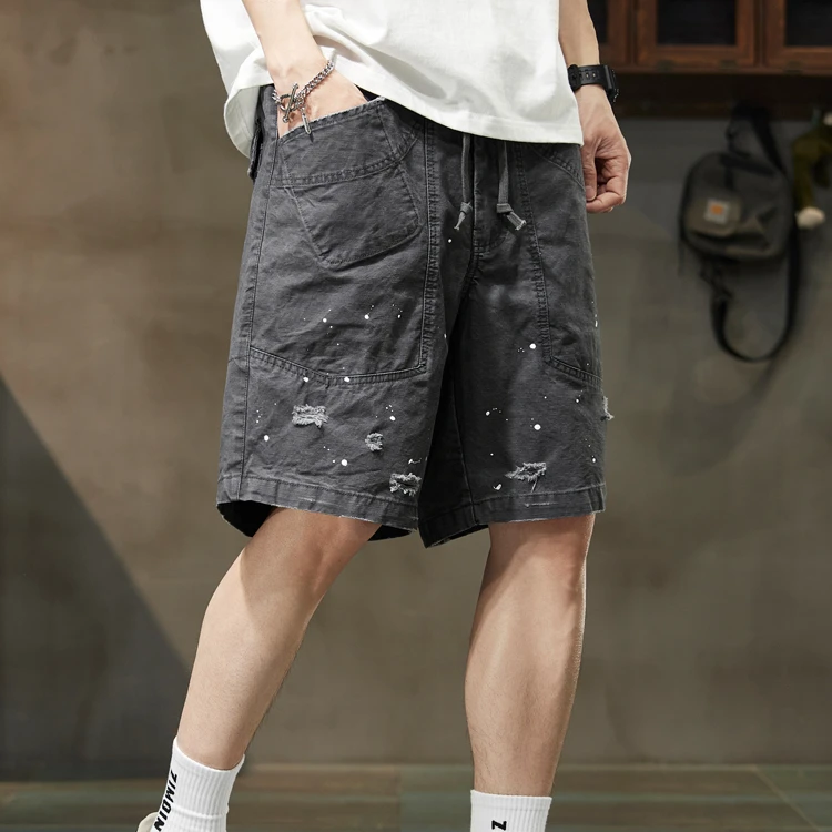 萨尔布勒斯个性油漆点工装短裤男士潮流宽松夏季破洞休闲五分男裤