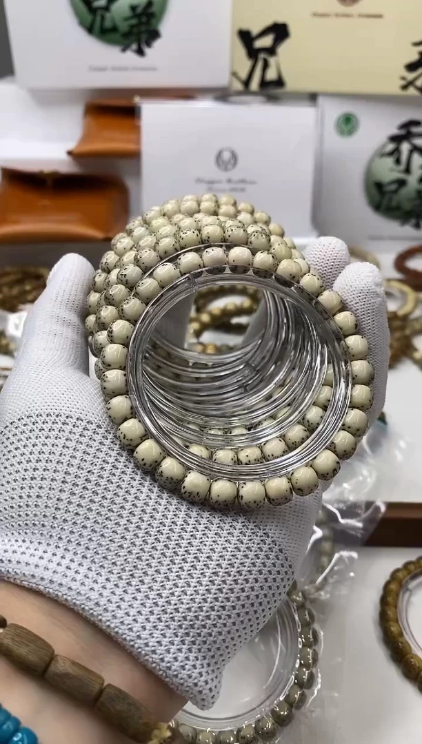 手串星月菩提109-骨瓷白河豚8*7mm